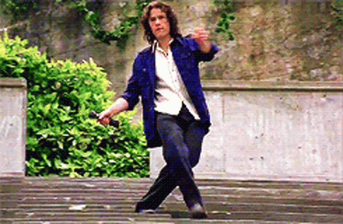 Heath Ledger dancing on high school stadium seats in 1999 film '10 Things I Hate about You'